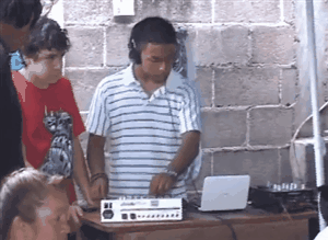Kid Acts Like a DJ with the Equipment Unplugged Funny GIF