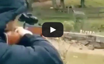 Kid shoots cans with perfect aim! Or does he? VIDEO copy