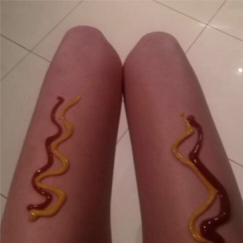 hot dog legs ketchup and mustard
