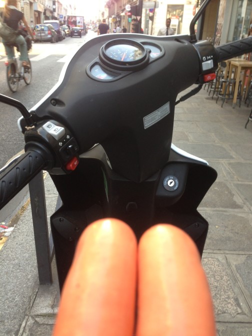 hot dog legs on a scooter