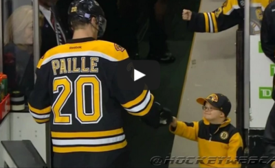 Young Fan Fist Bumps Boston Bruins after Pregame Warm Up