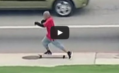 Man tries to flee from a car chase on a longboard