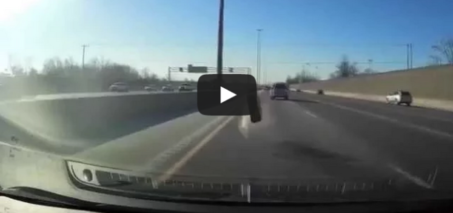Car Tire Smashes Through Windshield