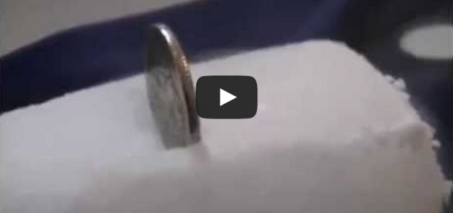 What happens if you insert a Coin into a Dry Ice Block?