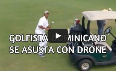 Drone flying on a golf course scares a golfer