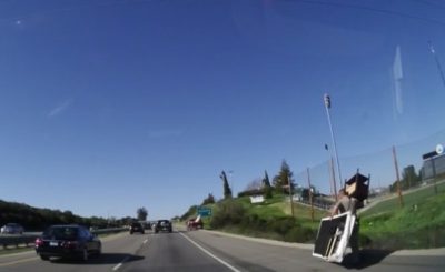 Police officer assists motorist in epic fashion