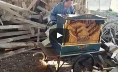 Guy playing "Smooth Criminal" on a Wood Pile