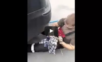 Russian guy blocks car exhaust